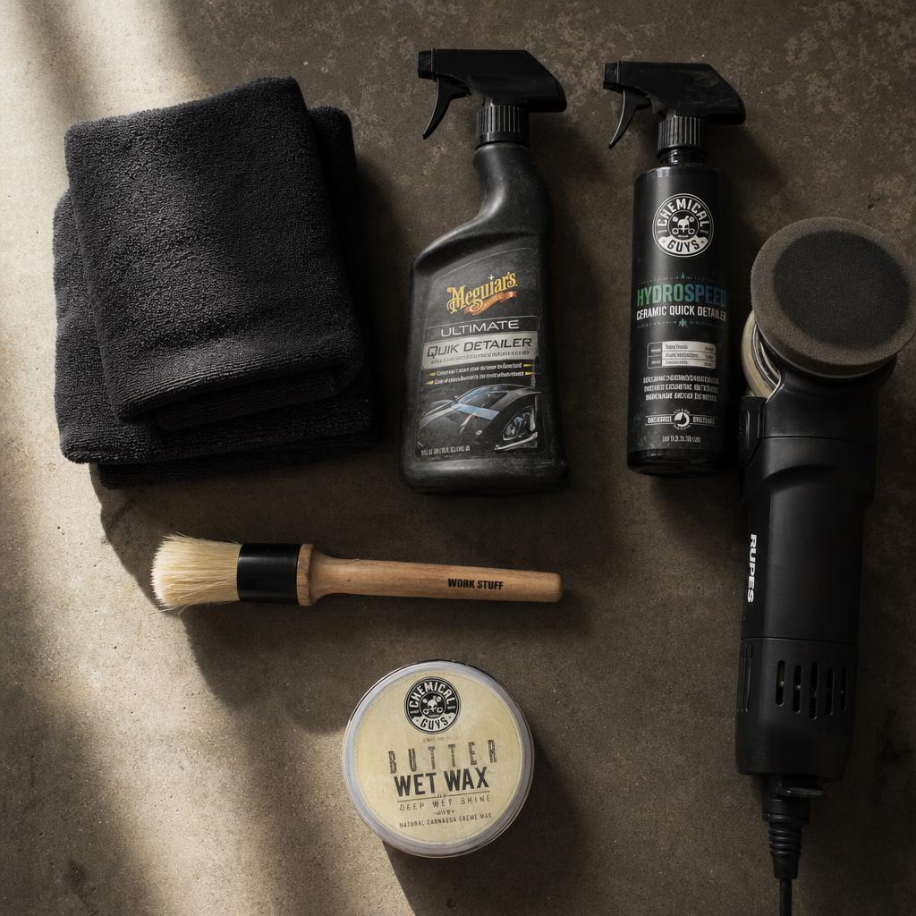 Overhead flat lay of premium detailing supplies